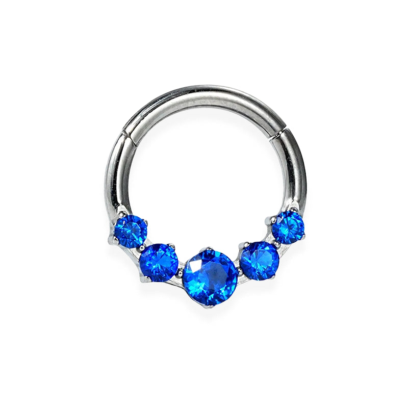 Anneau titane avec 4petit et 1 grand zircon bleue