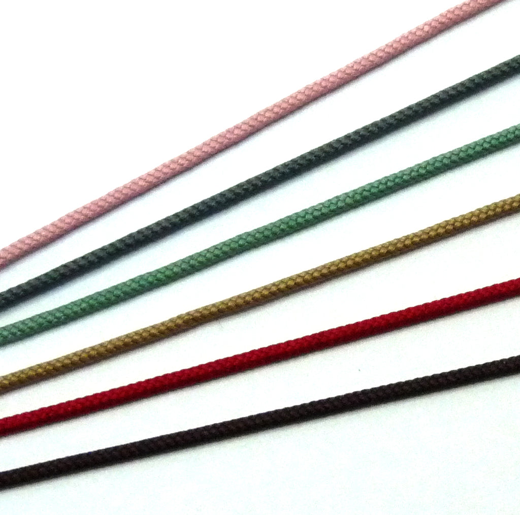 Bracelet perle cerclée sur cordon