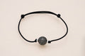 Bracelet homme perle gravée sur cordon