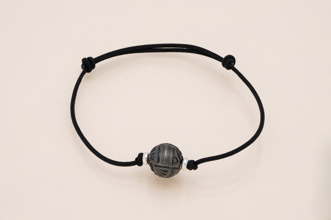 Bracelet homme perle gravée sur cordon