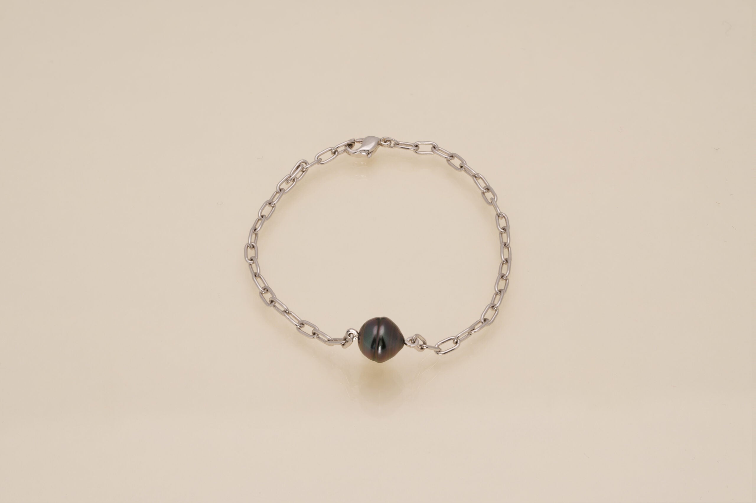 Bracelet argent et perle cerclée