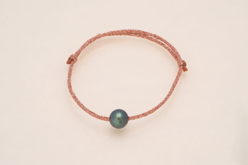 Bracelet perle ovale sur cordon doré - cuivré