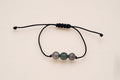 Bracelet 3 perles sur cordon noir