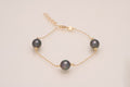 Bracelet en or avec 3 perles ovales