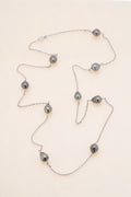 Sautoir argent et perles cerclées