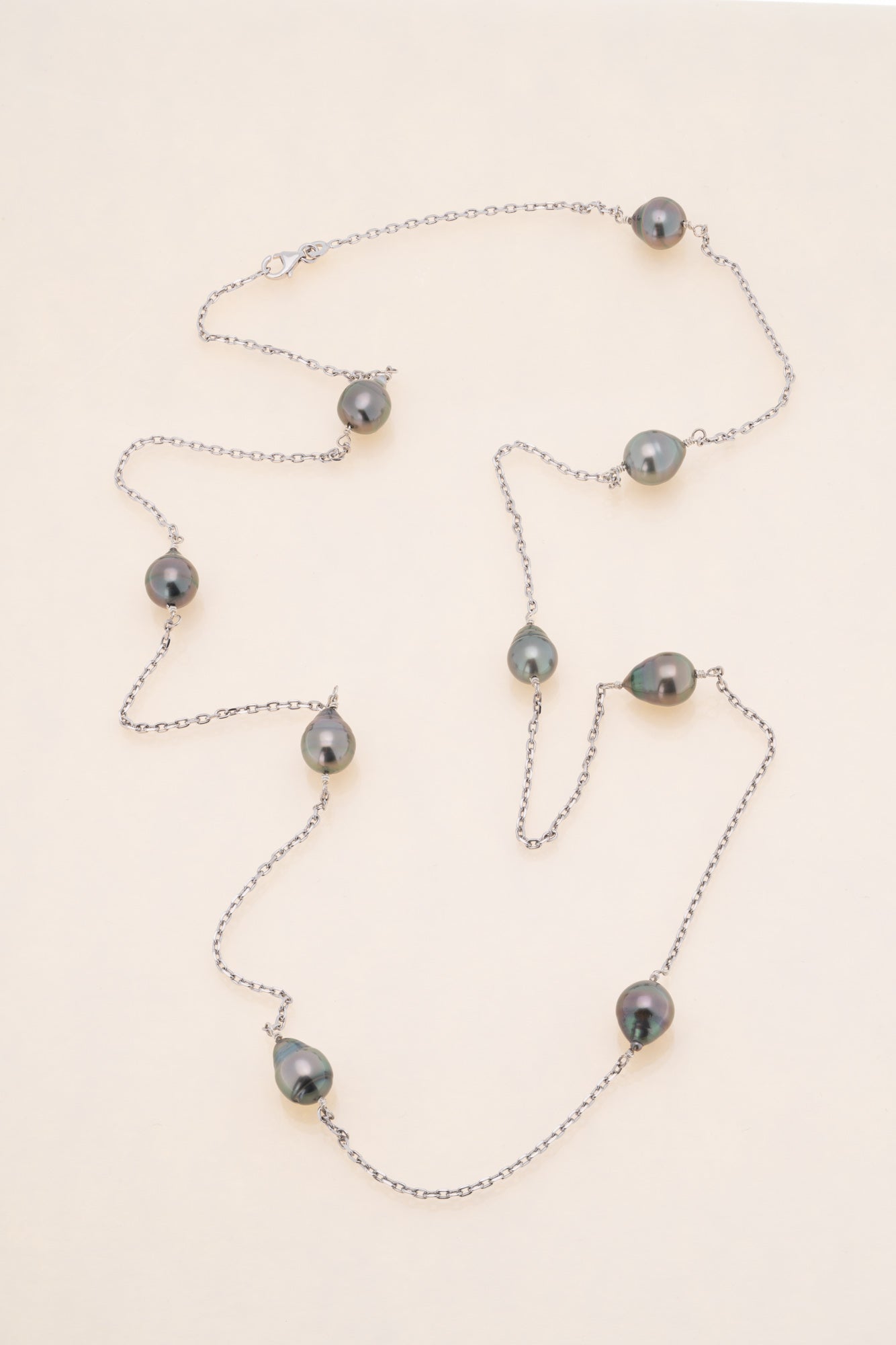 Sautoir argent et perles cerclées