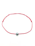 Collier perle cerclée sur cordon