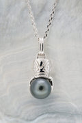 Pendentif Tiki argent et perle ovale
