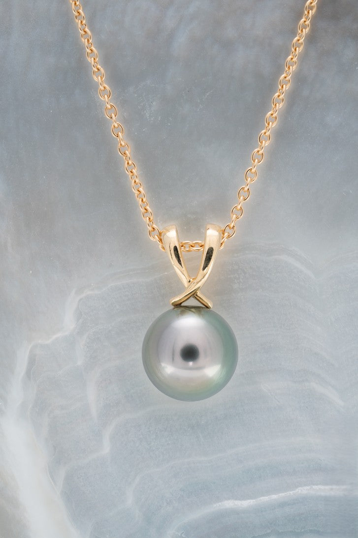 Pendentif or et perle ronde