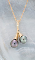 Pendentif or et perles ovales