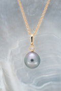 Pendentif or, diamant et perle ovale